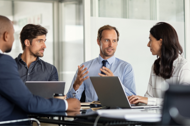 Business team having a discussion, conference table